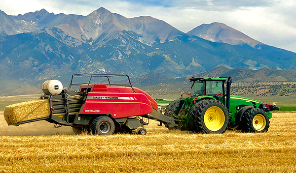 Stinger bailer with tractor